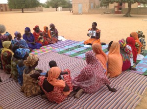 CHW conducting a health education presentation